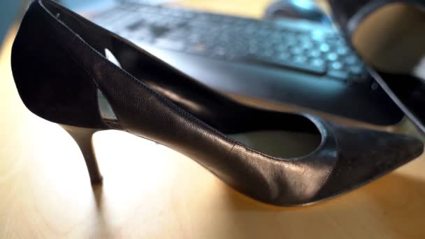 High heels on an office desk at workplace. - Footage, Video