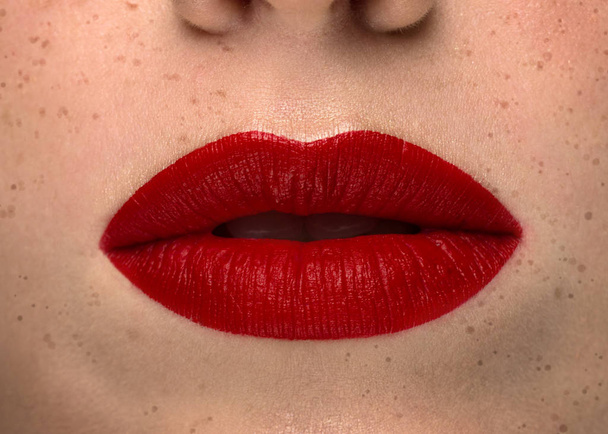Sexy lips. Macro of woman's face part. Sexy glossy lip makeup. Beauty red lip makeup detail. Beautiful make-up close-up.Lipstick and lipgloss.chubby passionate lips - Zdjęcie, obraz
