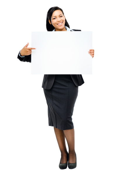 Happy mixed race business woman pointing at empty copy space iso - Foto, Imagen