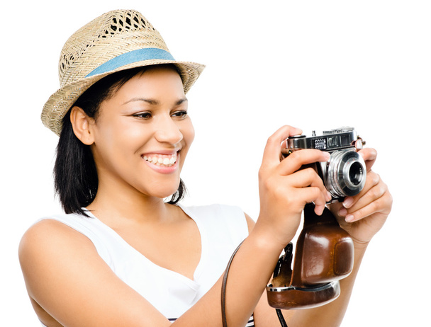 Beautiful mixed race woman taking photograph vintage camera isol - Фото, зображення