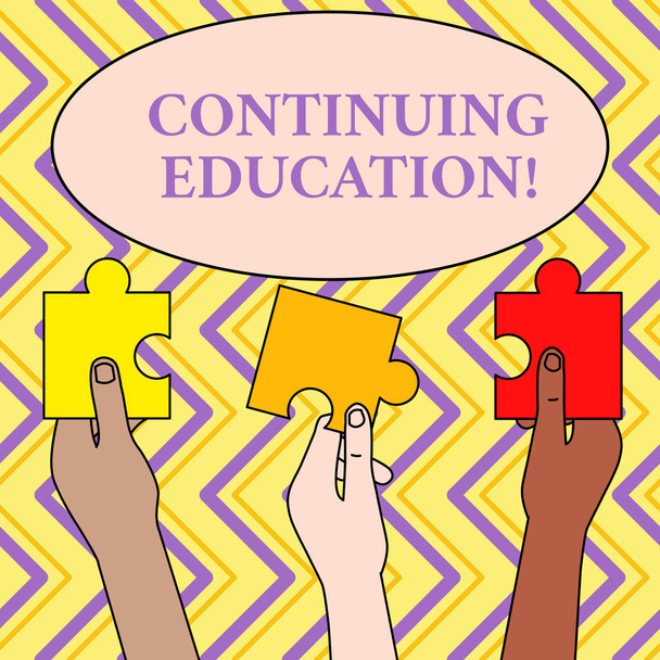 Writing note showing Continuing Education. Business photo showcasing Continued Learning Activity professionals engage in Three Colored Empty Jigsaw Puzzle Pieces Held in Different People Hands. - Photo, Image