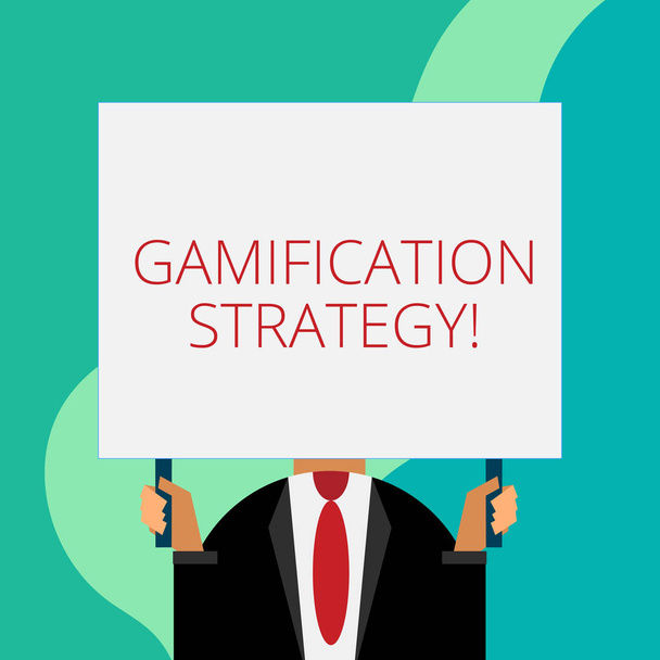 Handwriting text writing Gamification Strategy. Concept meaning use Rewards for Motivation Integrate Game Mechanics Just man chest dressed dark suit tie no face holding blank big rectangle. - Photo, Image