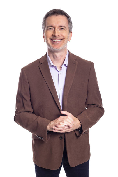 Middle aged bearded businessman on a white background wearing a brown jacket.  The mature man looks like a happy and smiling business executive.   - Photo, Image