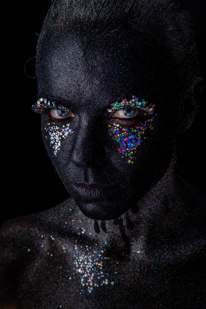 Girl in black makeup with sparkles - Photo, Image