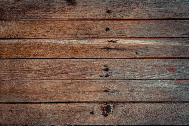Dark brown wood texture with natural striped pattern background  - Foto, imagen
