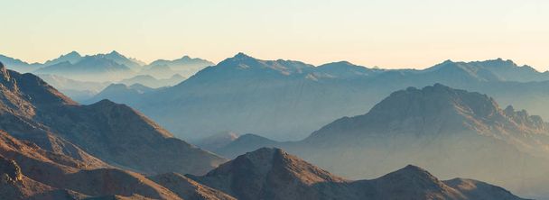 Amazing Sunrise at Sinai Mountain, Beautiful dawn in Egypt, early morning view of the top of Mount Moses - Photo, Image