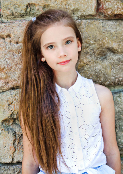 Portrait of adorable serious little girl child schoolgirl teenag - Foto, Imagem