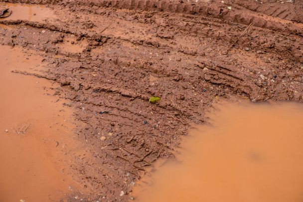 Close-up modder textuur achtergrond, na zware regenval. - Foto, afbeelding
