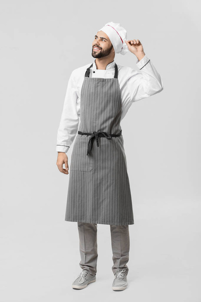 Handsome male chef on white background - 写真・画像