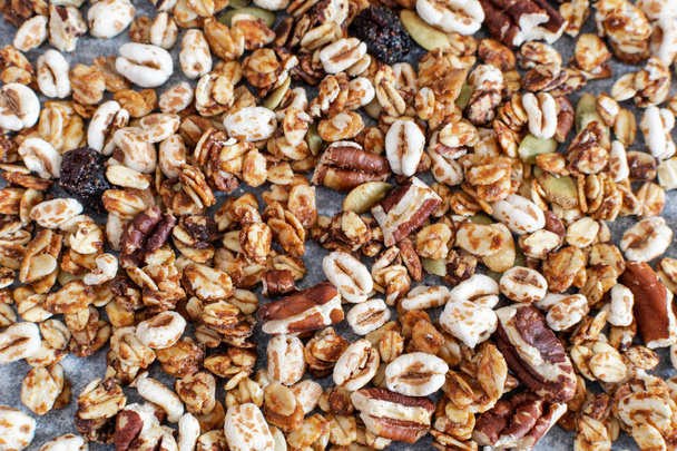 Organic homemade granola with pecan nuts texture - Photo, Image