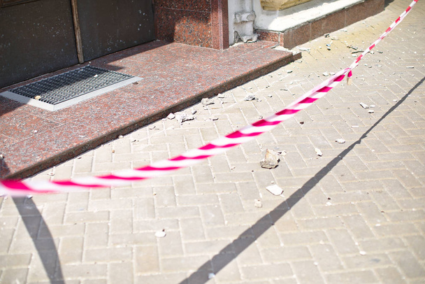 Red tape overlap by police entrance, building collapse, incident - Photo, Image