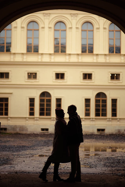 Beautiful pair of lovers walking in the autumn Park - Fotografie, Obrázek