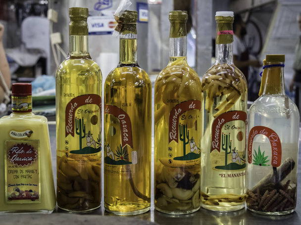 Mexico City, Mexico - Oct 21 2018: variety of Tequila with worms - 写真・画像