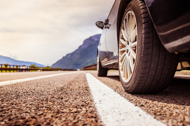 Car is standing on the breakdown lane, asphalt and tyre, Italy - Φωτογραφία, εικόνα