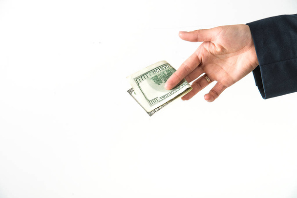 Рука держит американские доллары
 - Фото, изображение