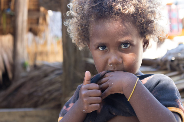 Portrait of melanesian kid in Santa Ana. - Фото, изображение