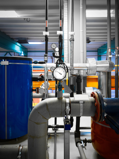 Insulated pipeline in industrial interior - Photo, Image