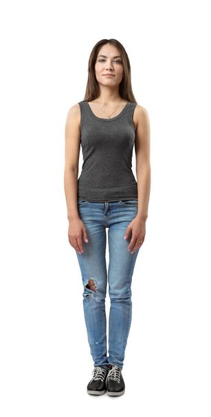 Young brunette girl wearing casual jeans and t-shirt isolated on white background - Foto, Bild