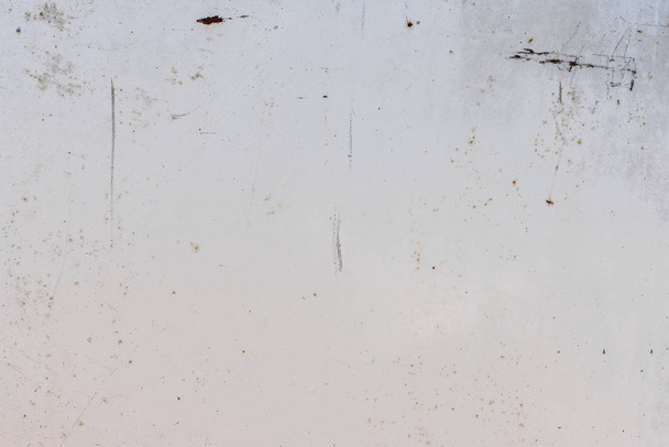 Metal texture with scratches and cracks which can be used as a background - Photo, Image