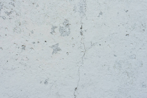 Texture, wall, concrete, it can be used as a background. Wall fragment with scratches and cracks - Foto, Imagen