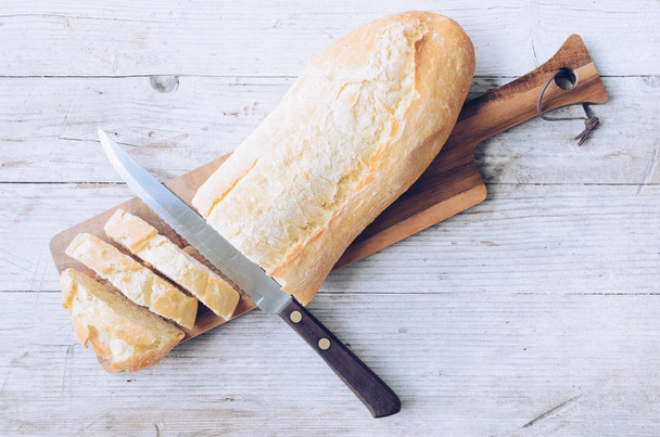 Fresh bread slice cutting knife - Photo, Image
