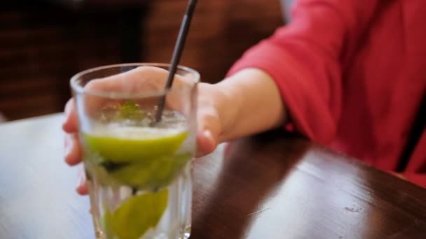 woman drink fresh lemon cocktail carefree leisure - Πλάνα, βίντεο