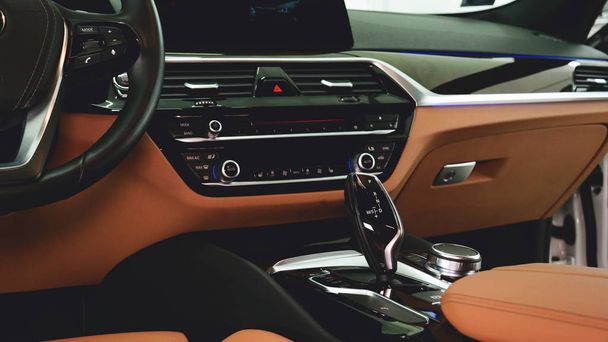 Closely shown are different parts of the car interior. Concept from: Car Garage, Glass lifts, Steering part, After dry cleaning, Absolutely new, New Generation Car. - 写真・画像