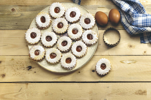 Traditional algerian cookies with apricot jam on rustic wooden. Holiday concept - Photo, Image
