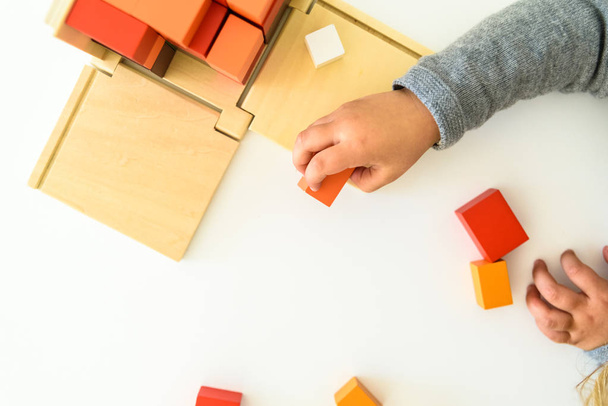 Child's hands using an educational toy for their cognitive devel - Φωτογραφία, εικόνα