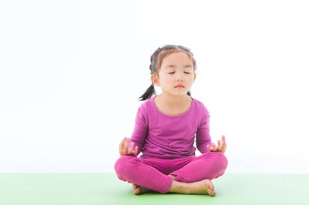little girl practice yoga - Foto, Imagen