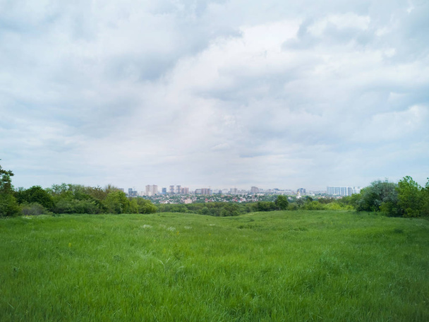 The grass and the city in Russia - Photo, image