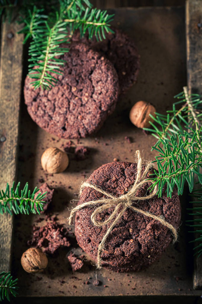 Top view of chocolate cookies made of nuts and oats - Fotografie, Obrázek