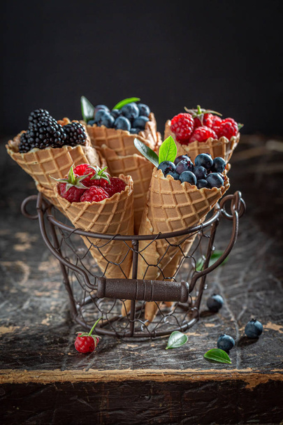 Mix of berries in waffels as homemade ice cream - Фото, изображение