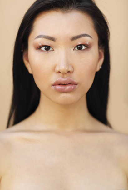 Beautiful asian model with long dark hair  - Photo, Image