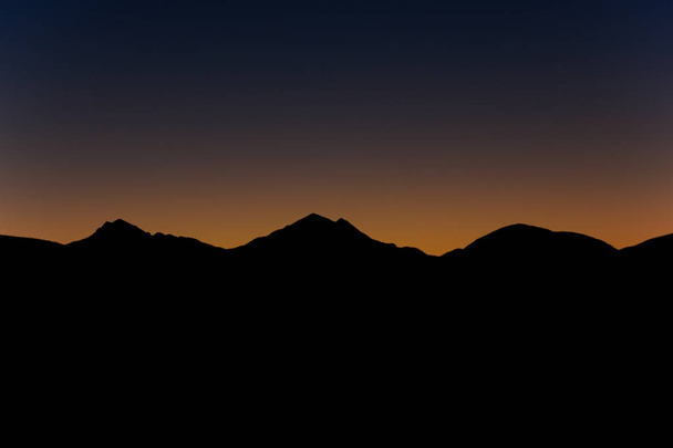 Kora Dawn over hegyvidéki Peak Horizon, Dél-Afrika - Fotó, kép