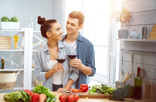 loving couple in the kitchen - Фото, изображение