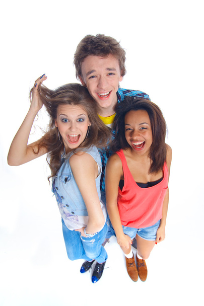 Três jovens adolescentes felizes a sorrir. Isolado sobre fundo branco
. - Foto, Imagem
