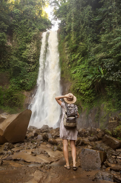  Woman near waterfal Git Git on Bali, Indonesia  - Φωτογραφία, εικόνα