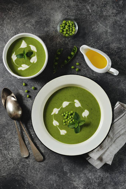 Cream of green pea soup with mint. Healthy food. Top view.  - Photo, Image