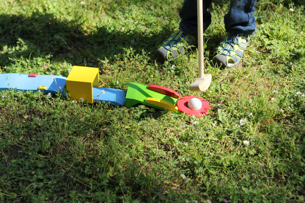 wooden mini golf on the grass, concept summer games in the fresh air - Photo, image