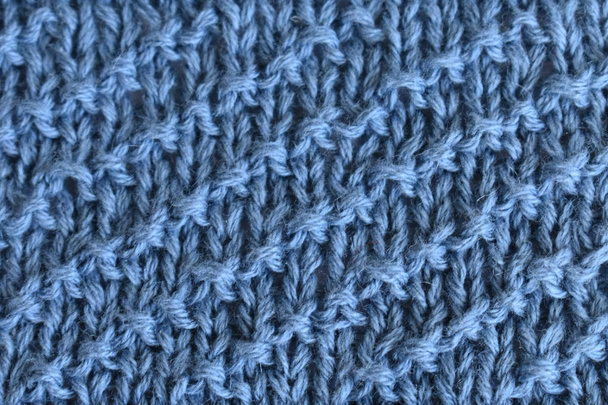 Diagonal linjat neulottu kangas tausta rakenne tai neulosta. Taustakuvio suunnitteluun. Neulominen tai neulominen. Neulonta tai neulonta kuvio
 - Valokuva, kuva