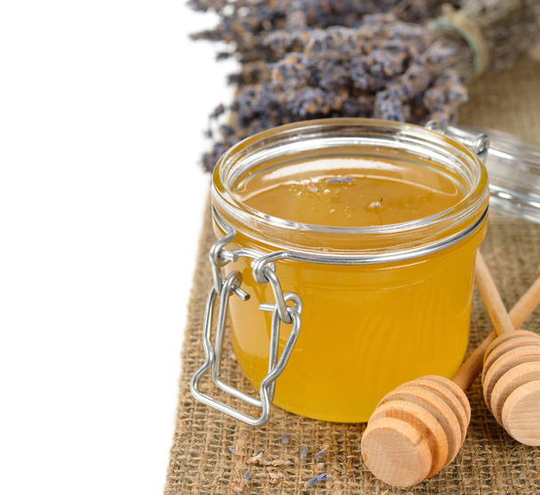 Honey in a glass jar - Foto, immagini