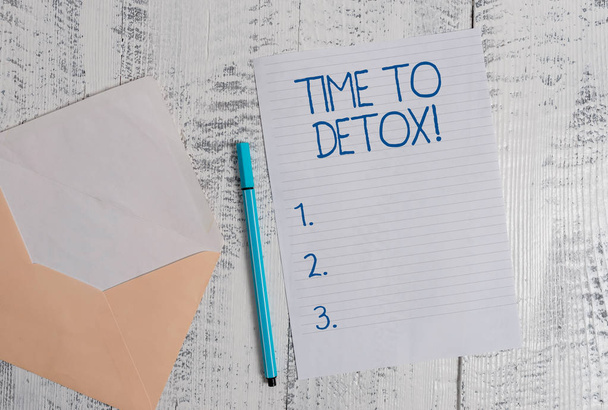 Conceptual hand writing showing Time To Detox. Business photo showcasing when you purify your body of toxins or stop consuming drug Colored envelope blank sheet ballpoint wooden background. - Foto, afbeelding