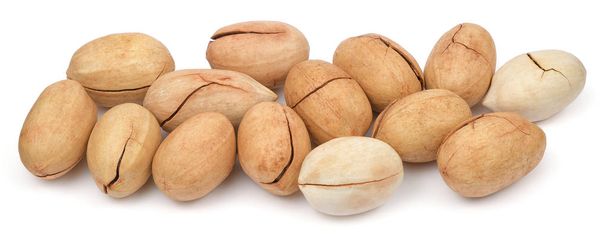 Pecské ořechy, izolované na bílém pozadí. Hromada pekanů je uzavřena. Sbírka ořechů - Fotografie, Obrázek