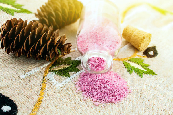 pink salt on a linen cloth  . Bath salts and rose petals . Spa and wellness . care of the woman's body - Photo, Image