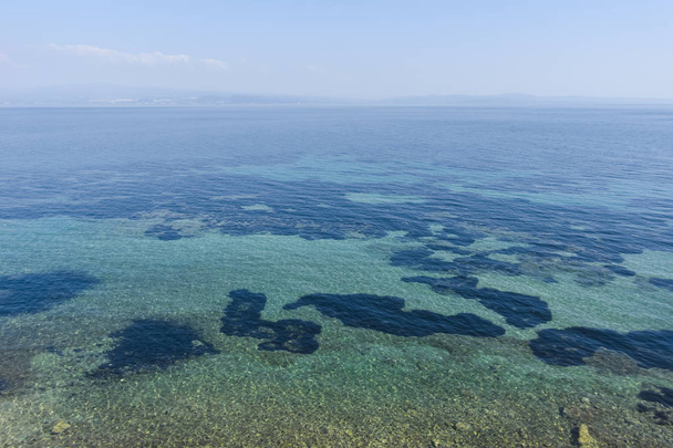 Seascape of coastline of town of Nea Fokea, Kassandra, Chalkidiki, Central Macedonia, Greece - Photo, Image