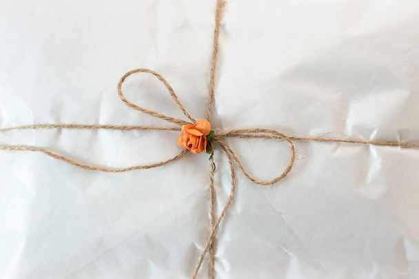 white paper package tied with string - 写真・画像