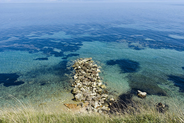 Seascape of coastline of town of Nea Fokea, Kassandra, Chalkidiki, Central Macedonia, Greece - Photo, Image
