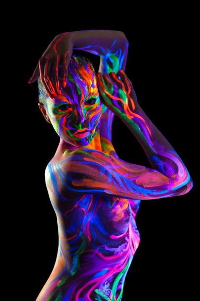 Girl with colorful make-up posing in dark - Фото, зображення