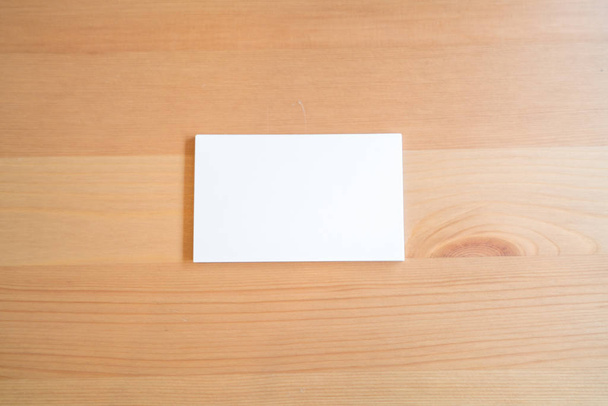 Blank business cards on wooden surface - Foto, afbeelding